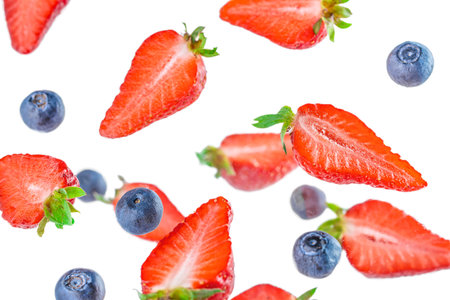 Fresh organic blueberry and strawberry on a wooden background. top view Healthy eating concept.