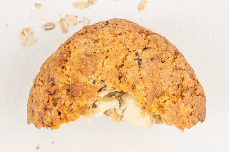 Healthy oatmeal cookies filled with cheese on white background. biscuits recipe. Delicious homemade...