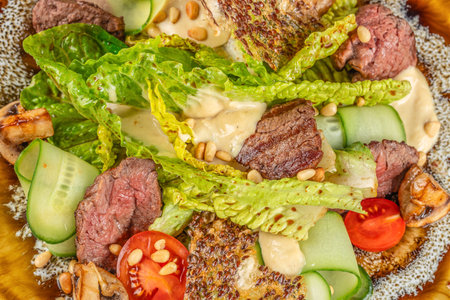beef steak medium rare, fresh greens and vegetable salad. Food recipe background. Close up. top view.の写真素材