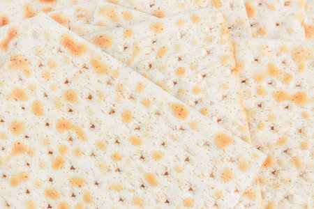 Matzah for passover Jewish pesach background. top view,