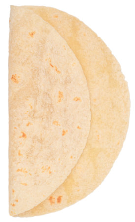 Fresh tortilla folded in half isolated on white background. Traditional flatbread for tacos, burritos, quesadillas, Mexican and Tex-Mex cuisine.の写真素材