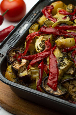 Blurred image of homemade food. Baked vegetables in the oven. Home cooking.の写真素材