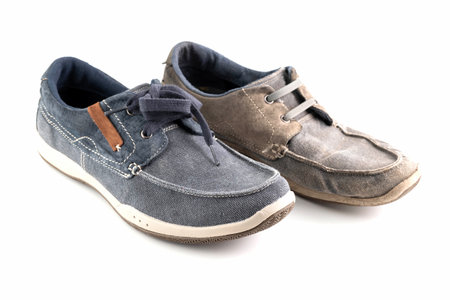 On a white background, new and old shoes.の写真素材