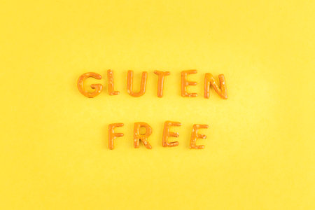 The inscription gluten free from cookies on a yellow background.の写真素材