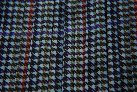 Patterned textiles laid out on the table.