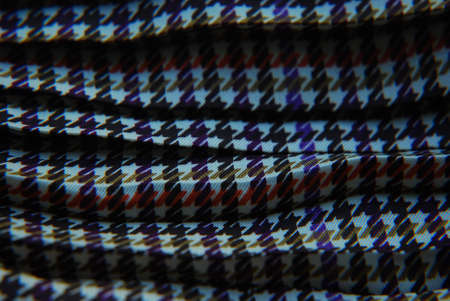 Patterned textiles laid out on the table.
