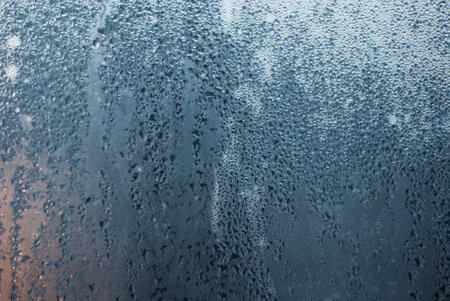 Water drops on the glass as a background. Close-up.の写真素材