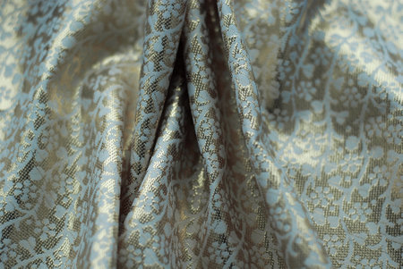 Texture, background, pattern, postcard, silk fabric of beige color, lace trim.の写真素材