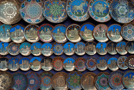 Traditional souvenir in the city of Bukhara. Plates on a street market in Uzbekistanの写真素材