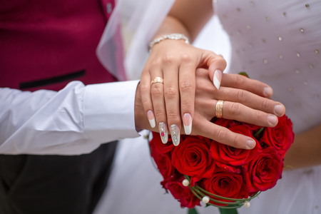 The hands of the bride and groomの写真素材