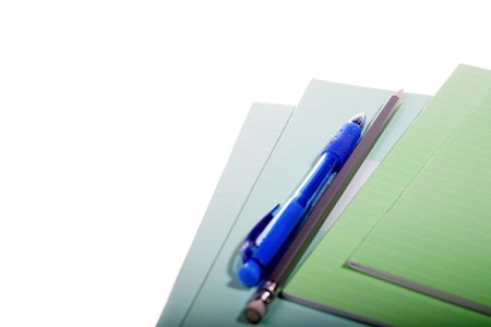 notebooks pen and pencil isolated on white