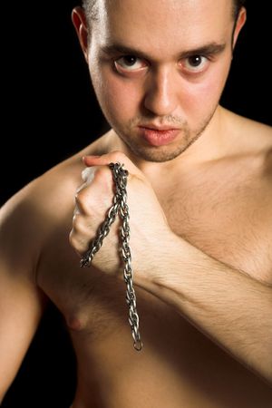 Young handsome man on black isolated backgroundの写真素材