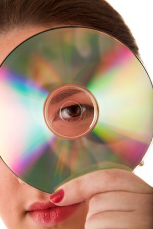 woman with compact disk on white backgroundの写真素材