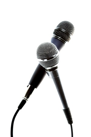 two microphones isolated on the white backgroundの写真素材