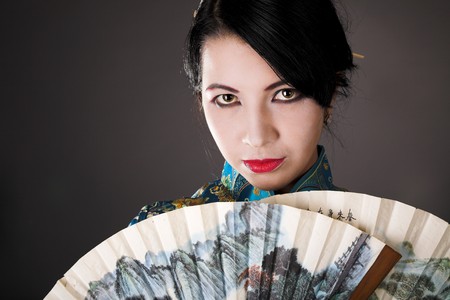 young beauty japanese woman with fanの写真素材