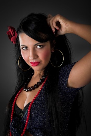 young beauty gipsy girl on the grey backgroungの写真素材