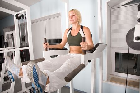 Fitness. Young caucasian woman in the gymの写真素材