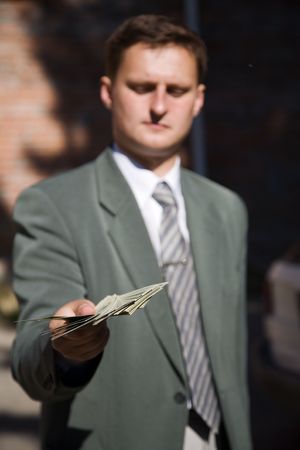 businessman with lot of moneyの写真素材