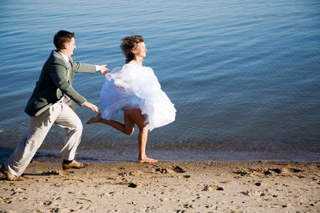 happy couple on the beachの写真素材