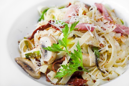 fresh pasta isolated on whiteの写真素材