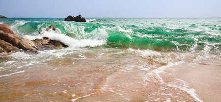 strong blue wave on the ocean beach