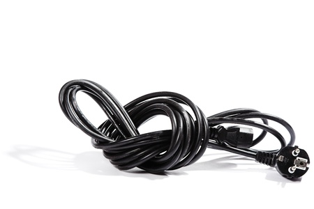 Black electric cable isolated on white backgroundの写真素材