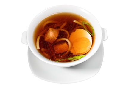 soup in white bowl isolated on white backgroundの写真素材