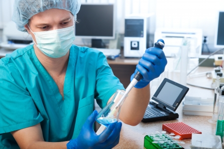 scientist doing DNA test in modern laboratoryの写真素材