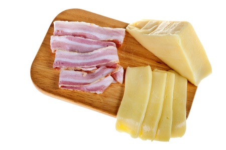cheese and pork isolated on whiteの写真素材