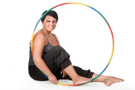 fat woman with toy hoopの写真素材