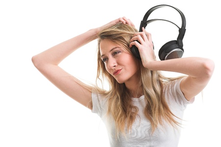 Beauty woman listening music in headphoneの写真素材