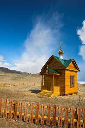 Wooden chapel on the bank Baikal lakeの写真素材