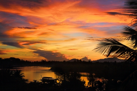 tropical sunset with big riverの写真素材