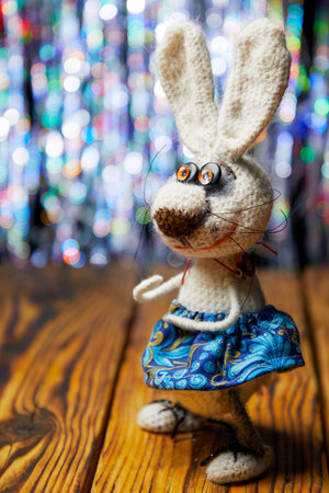 Funny homemade toy. hare colorful christmas backgroundの写真素材