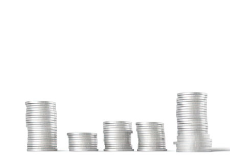 Stack of silver coins isolated on white background. Ai-generated imageの素材