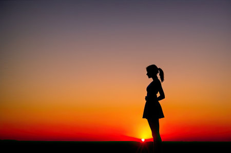 Woman Silhouetted Against Orange Sunset Sky on Horizon. Ai-generated imageの素材