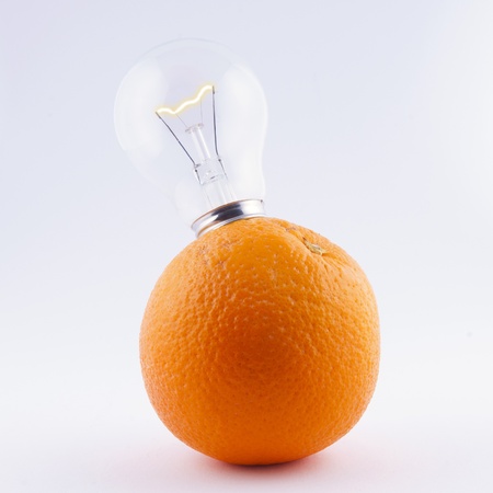 bulb in orange - energy fruitsの写真素材