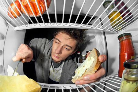 man near the fridge is food 2の写真素材