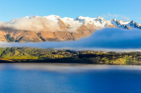 Clouds over the lake in Lord of the Rings film location, Glenorchy, New Zealandの写真素材
