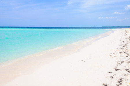 Alone on a secluded white sand beach in the tropical Cayo Levisa Island in Cubaの写真素材