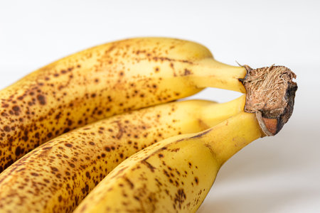 bunch of ripe bananas on white backgroundの写真素材