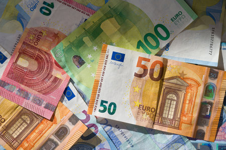 Multiple euro banknotes close up, finance conceptの写真素材
