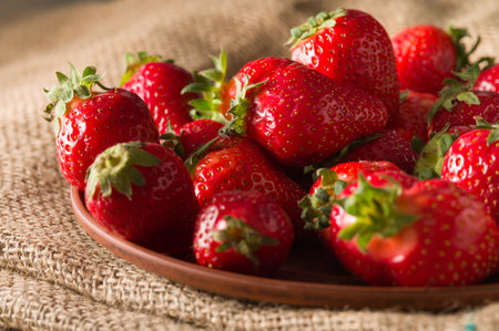 Group of red ripe strawberries close-up, food backgroundの写真素材