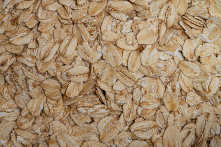 Close-up background of raw oatmeal, food backgroundの写真素材