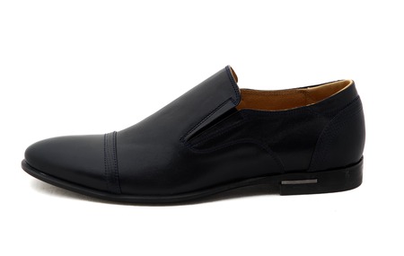 Black patent leather men shoes against white background. Male fashion with shoes on white.  The black mans shoes isolated on white background.の写真素材