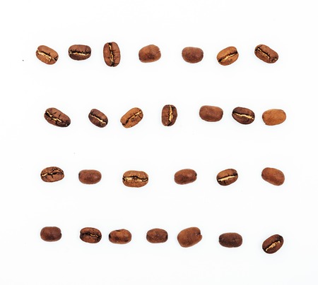 coffee beans isolated on white background. roasted coffee beans, can be used as a background.の写真素材