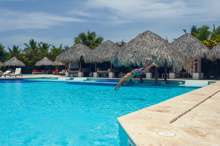 Outdoor resort pool Swimming pool of luxury hotel. Swimming pool in luxury resort near the sea. Tropical Paradise. Swimming pool in spa resort. Dominican Republic, Seychelles, Caribbean, Bahamas.のeditorial素材