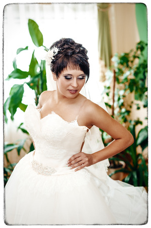 beautiful bride is getting ready in the morning.の写真素材