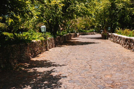Road in park. Ancient village Altos de Chavon - Colonial town reconstructed in Dominican Republicの写真素材
