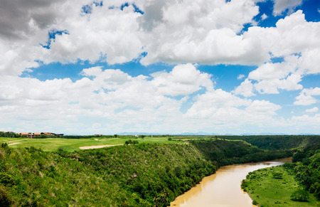 Tropical river Chavon in Dominican Republic. Vocation and travel. Ancient village Altos de Chavon - Colonial town reconstructed in Casa de Campo, La Romana, Dominican Republicの写真素材
